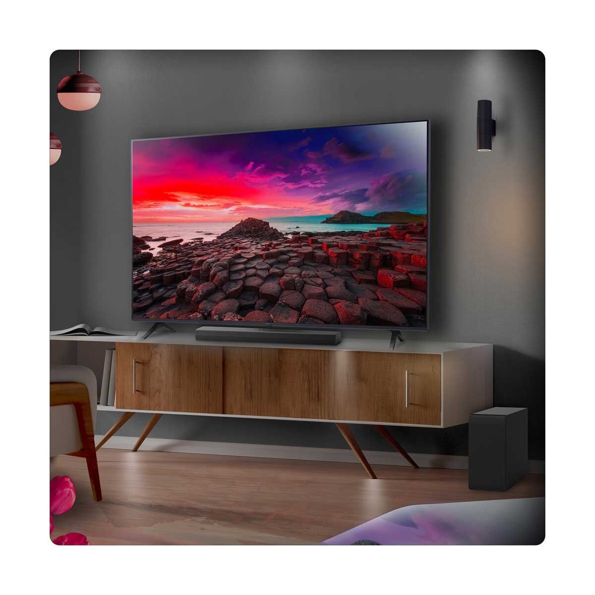 LG 4.1 Channel Soundbar and Wireless Subwoofer with Bluetooth US40TR